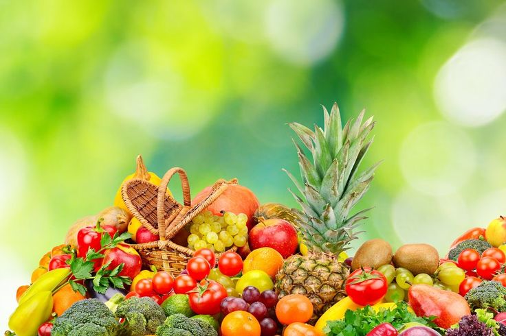 Large pile healthy fruits and vegetables on…